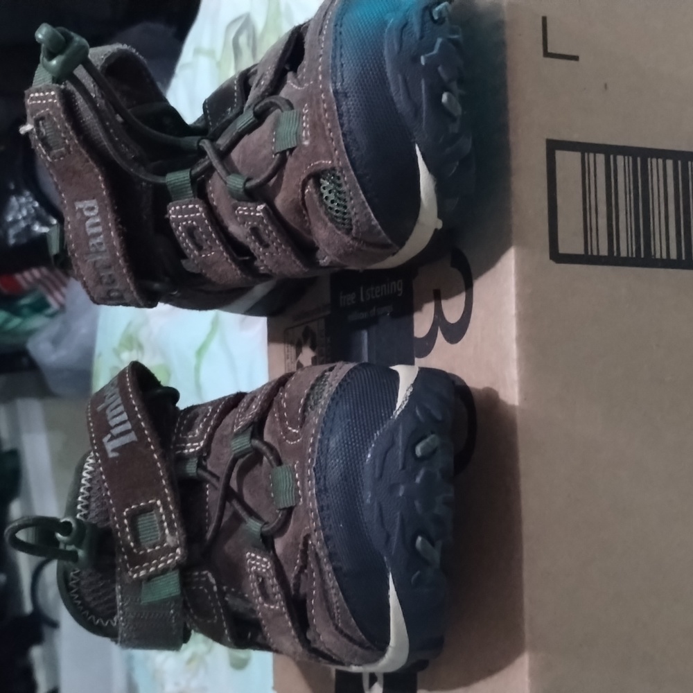 Timberland brown green used one time bought the wrong size didn't fit him